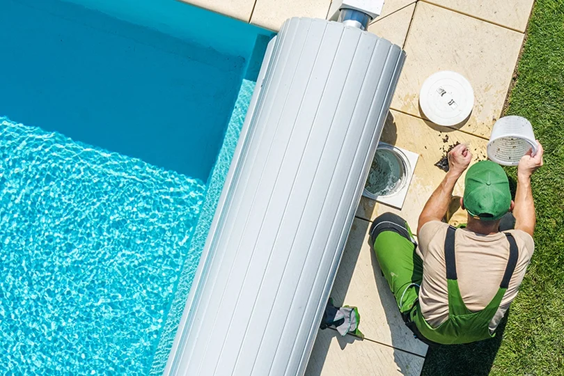 Pool service technician at work