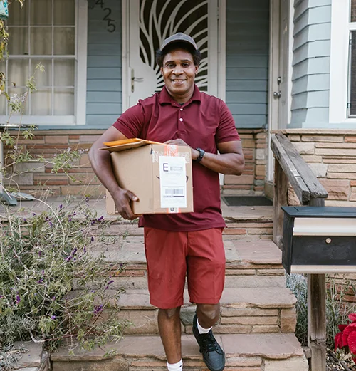 Courier delivery man smiling