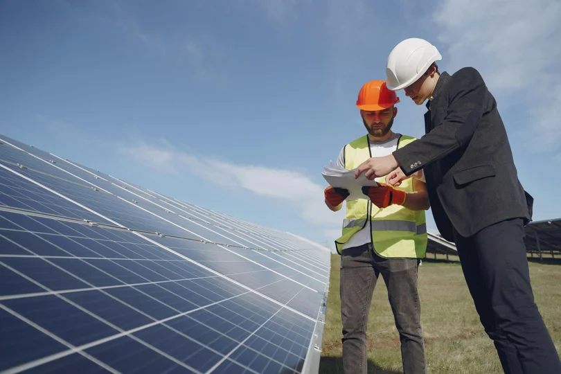 Electrician installing solar panels